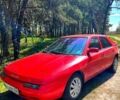 Красный Мазда 323, объемом двигателя 1.6 л и пробегом 322 тыс. км за 1650 $, фото 1 на Automoto.ua