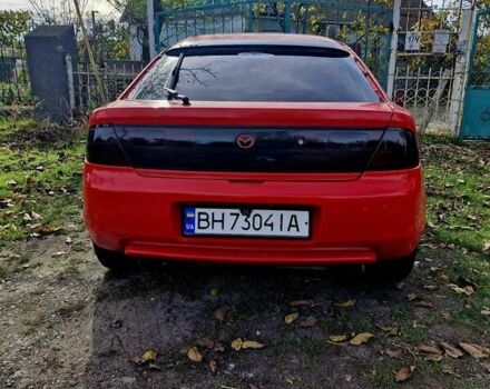 Красный Мазда 323, объемом двигателя 1.84 л и пробегом 303 тыс. км за 2650 $, фото 5 на Automoto.ua