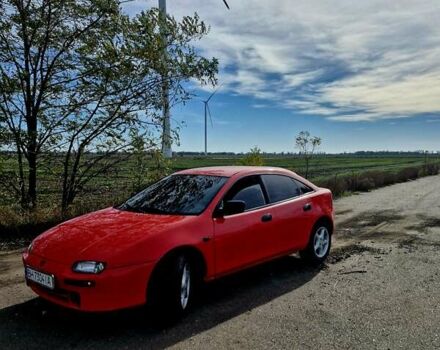 Красный Мазда 323, объемом двигателя 1.84 л и пробегом 303 тыс. км за 2650 $, фото 3 на Automoto.ua