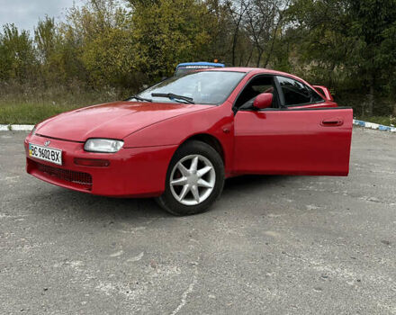 Красный Мазда 323, объемом двигателя 1.49 л и пробегом 450 тыс. км за 2000 $, фото 1 на Automoto.ua