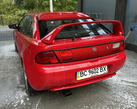 Красный Мазда 323, объемом двигателя 1.49 л и пробегом 450 тыс. км за 2000 $, фото 6 на Automoto.ua