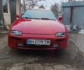 Красный Мазда 323, объемом двигателя 1.8 л и пробегом 355 тыс. км за 3000 $, фото 1 на Automoto.ua