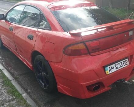 Красный Мазда 323, объемом двигателя 2 л и пробегом 300 тыс. км за 800 $, фото 3 на Automoto.ua