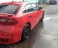 Красный Мазда 323, объемом двигателя 2 л и пробегом 300 тыс. км за 800 $, фото 1 на Automoto.ua