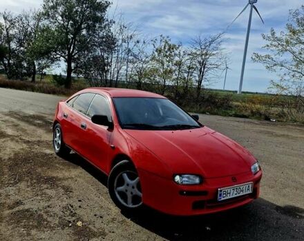 Красный Мазда 323, объемом двигателя 1.84 л и пробегом 303 тыс. км за 2650 $, фото 1 на Automoto.ua