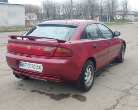 Красный Мазда 323, объемом двигателя 1.5 л и пробегом 367 тыс. км за 2400 $, фото 4 на Automoto.ua