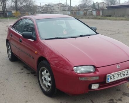 Красный Мазда 323, объемом двигателя 1.5 л и пробегом 367 тыс. км за 2400 $, фото 6 на Automoto.ua