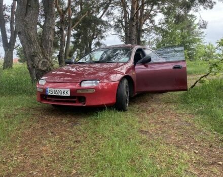 Красный Мазда 323, объемом двигателя 1.5 л и пробегом 639 тыс. км за 2100 $, фото 1 на Automoto.ua