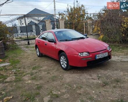 Красный Мазда 323, объемом двигателя 1.5 л и пробегом 258 тыс. км за 1600 $, фото 9 на Automoto.ua