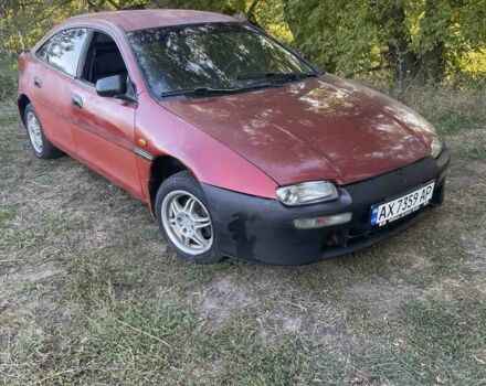 Красный Мазда 323, объемом двигателя 1.5 л и пробегом 237 тыс. км за 850 $, фото 3 на Automoto.ua