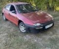 Красный Мазда 323, объемом двигателя 1.5 л и пробегом 237 тыс. км за 850 $, фото 3 на Automoto.ua
