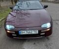 Красный Мазда 323, объемом двигателя 1.5 л и пробегом 152 тыс. км за 1600 $, фото 1 на Automoto.ua