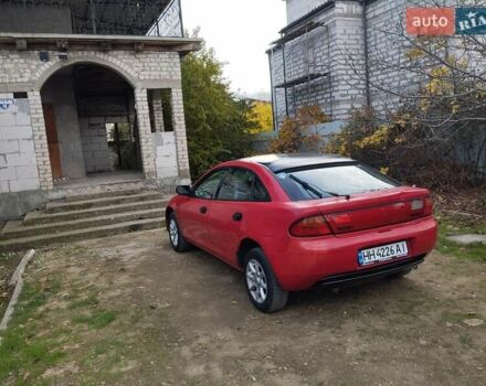 Красный Мазда 323, объемом двигателя 1.5 л и пробегом 258 тыс. км за 1600 $, фото 7 на Automoto.ua
