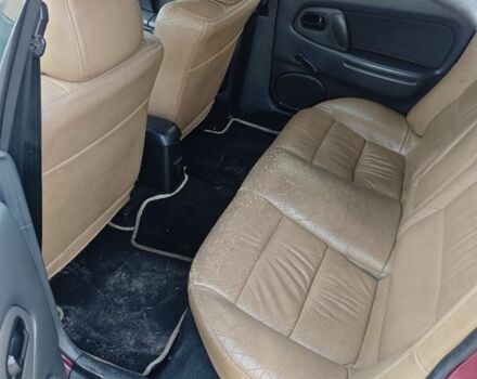 Червоний Мазда 323, об'ємом двигуна 1.5 л та пробігом 500 тис. км за 1000 $, фото 16 на Automoto.ua