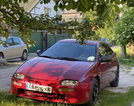 Красный Мазда 323, объемом двигателя 1.5 л и пробегом 639 тыс. км за 2100 $, фото 3 на Automoto.ua