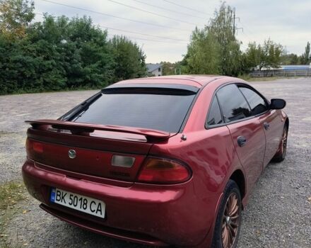 Красный Мазда 323, объемом двигателя 1.5 л и пробегом 431 тыс. км за 2700 $, фото 3 на Automoto.ua