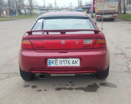 Красный Мазда 323, объемом двигателя 1.5 л и пробегом 367 тыс. км за 2400 $, фото 3 на Automoto.ua