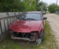 Красный Мазда 323, объемом двигателя 1.5 л и пробегом 500 тыс. км за 700 $, фото 1 на Automoto.ua