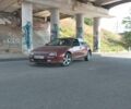 Красный Мазда 323, объемом двигателя 2 л и пробегом 213 тыс. км за 3500 $, фото 1 на Automoto.ua