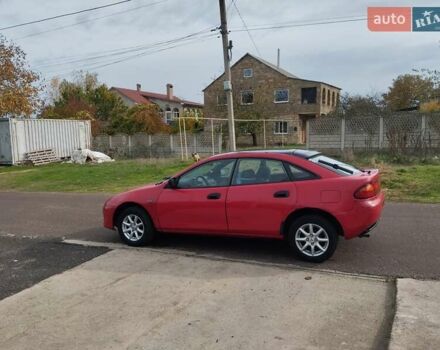 Красный Мазда 323, объемом двигателя 1.5 л и пробегом 258 тыс. км за 1600 $, фото 3 на Automoto.ua