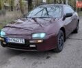 Красный Мазда 323, объемом двигателя 1.49 л и пробегом 153 тыс. км за 1700 $, фото 1 на Automoto.ua