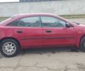 Красный Мазда 323, объемом двигателя 1.5 л и пробегом 367 тыс. км за 2400 $, фото 5 на Automoto.ua