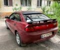 Красный Мазда 323, объемом двигателя 1.5 л и пробегом 130 тыс. км за 1700 $, фото 3 на Automoto.ua