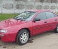 Красный Мазда 323, объемом двигателя 1.5 л и пробегом 367 тыс. км за 2400 $, фото 1 на Automoto.ua