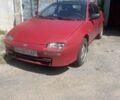 Красный Мазда 323, объемом двигателя 1.5 л и пробегом 330 тыс. км за 900 $, фото 1 на Automoto.ua