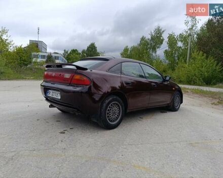 Красный Мазда 323, объемом двигателя 1.5 л и пробегом 278 тыс. км за 2700 $, фото 4 на Automoto.ua