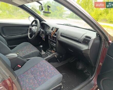 Червоний Мазда 323, об'ємом двигуна 1.5 л та пробігом 278 тис. км за 2500 $, фото 7 на Automoto.ua