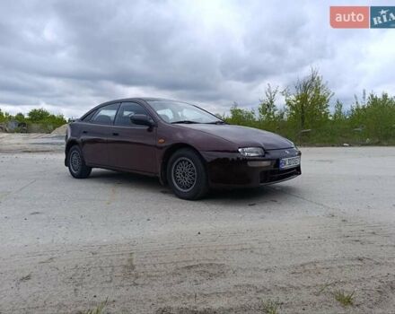 Червоний Мазда 323, об'ємом двигуна 1.5 л та пробігом 278 тис. км за 2500 $, фото 6 на Automoto.ua