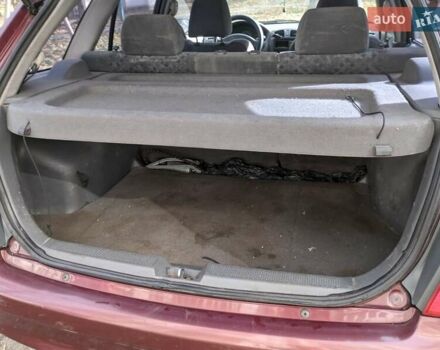 Красный Мазда 323, объемом двигателя 1.5 л и пробегом 487 тыс. км за 2250 $, фото 3 на Automoto.ua