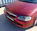 Червоний Мазда 323, об'ємом двигуна 1.5 л та пробігом 260 тис. км за 1500 $, фото 1 на Automoto.ua