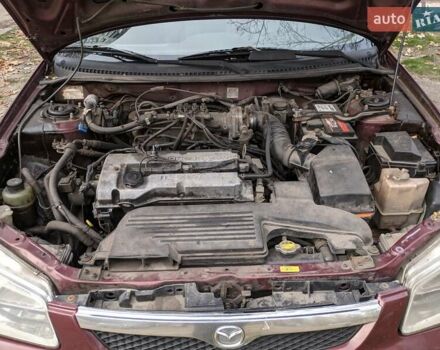 Красный Мазда 323, объемом двигателя 1.5 л и пробегом 487 тыс. км за 2250 $, фото 2 на Automoto.ua