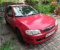 Красный Мазда 323, объемом двигателя 1.6 л и пробегом 124 тыс. км за 3700 $, фото 1 на Automoto.ua