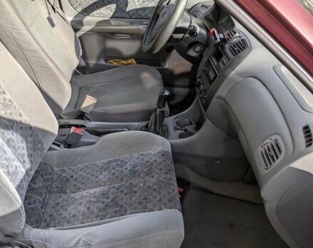 Красный Мазда 323, объемом двигателя 1.5 л и пробегом 487 тыс. км за 2250 $, фото 5 на Automoto.ua