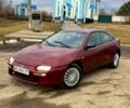 Красный Мазда 323, объемом двигателя 1.5 л и пробегом 250 тыс. км за 1650 $, фото 1 на Automoto.ua