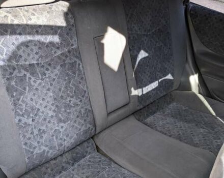 Красный Мазда 323, объемом двигателя 1.5 л и пробегом 487 тыс. км за 2250 $, фото 4 на Automoto.ua