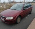 Красный Мазда 323, объемом двигателя 1.5 л и пробегом 285 тыс. км за 2000 $, фото 1 на Automoto.ua