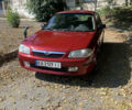 Красный Мазда 323, объемом двигателя 1.5 л и пробегом 412 тыс. км за 3200 $, фото 1 на Automoto.ua