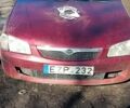 Красный Мазда 323, объемом двигателя 2 л и пробегом 317 тыс. км за 677 $, фото 1 на Automoto.ua