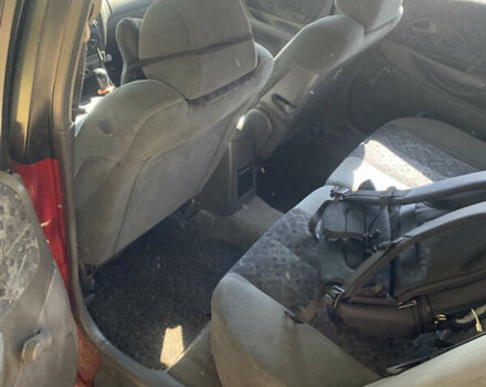 Красный Мазда 323, объемом двигателя 1.5 л и пробегом 412 тыс. км за 3200 $, фото 5 на Automoto.ua