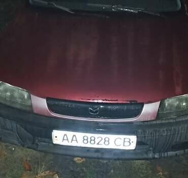 Красный Мазда 323, объемом двигателя 1.3 л и пробегом 250 тыс. км за 2500 $, фото 4 на Automoto.ua