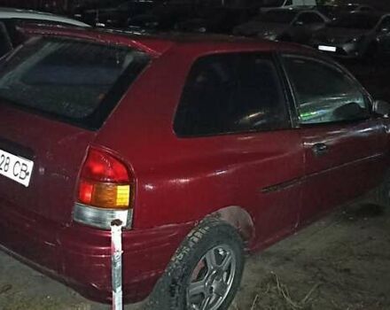 Красный Мазда 323, объемом двигателя 1.3 л и пробегом 250 тыс. км за 2500 $, фото 7 на Automoto.ua