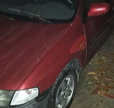 Красный Мазда 323, объемом двигателя 1.3 л и пробегом 250 тыс. км за 2500 $, фото 9 на Automoto.ua