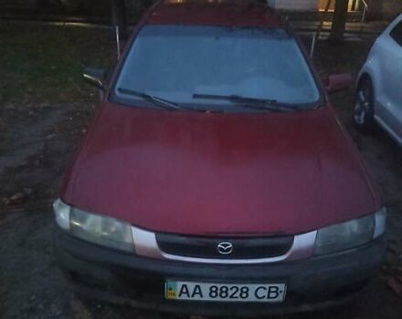 Красный Мазда 323, объемом двигателя 1.3 л и пробегом 250 тыс. км за 2500 $, фото 2 на Automoto.ua