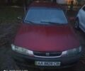 Красный Мазда 323, объемом двигателя 1.3 л и пробегом 250 тыс. км за 2200 $, фото 1 на Automoto.ua