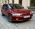 Красный Мазда 323, объемом двигателя 1.3 л и пробегом 340 тыс. км за 1850 $, фото 1 на Automoto.ua