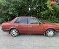 Червоний Мазда 323, об'ємом двигуна 1.3 л та пробігом 450 тис. км за 950 $, фото 6 на Automoto.ua
